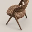 Silla de comedor de nogal y bouclé.webp