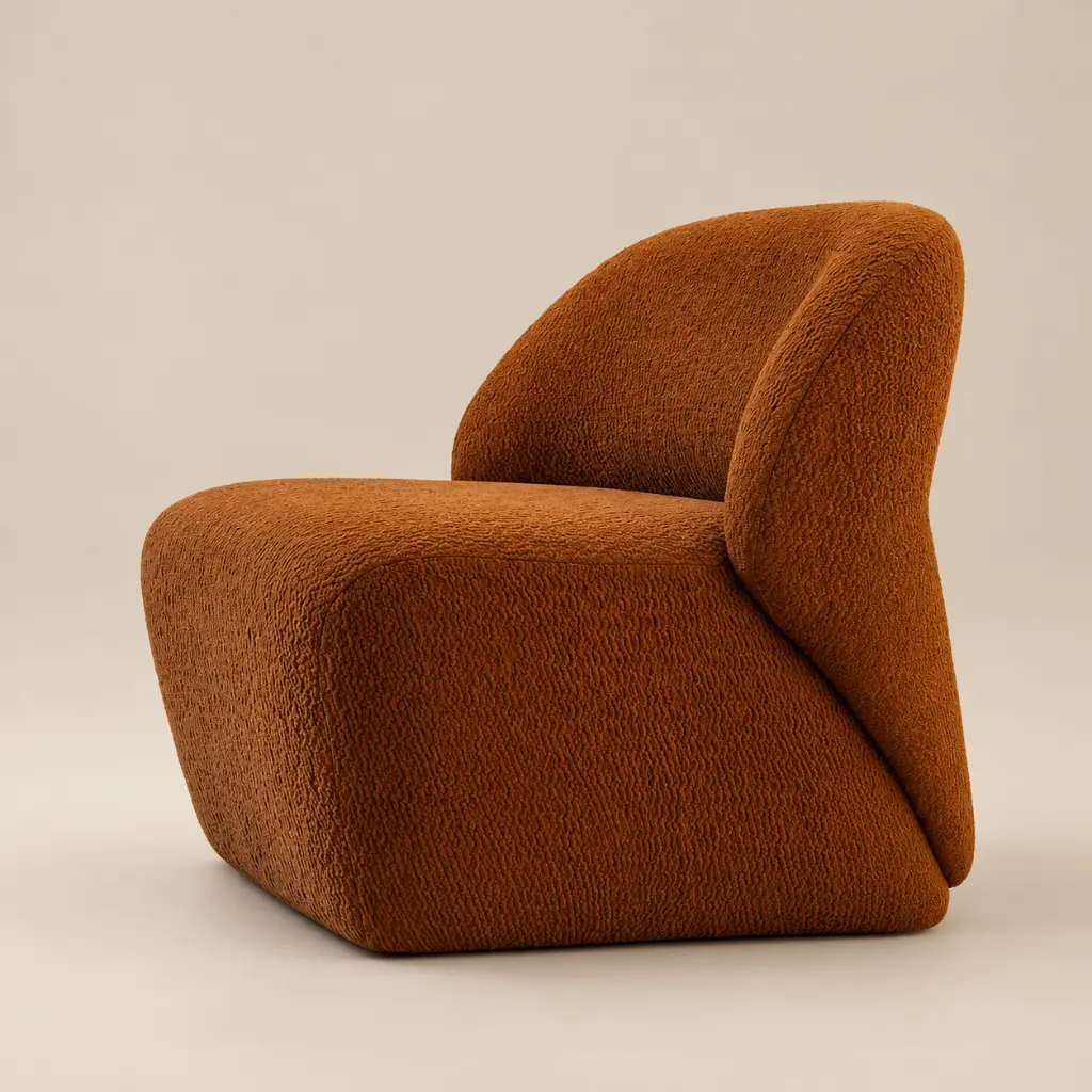 Sillón bouclé terracota en estudio.webp